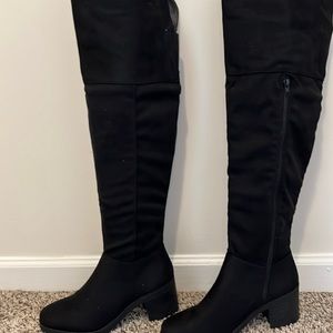 Over the knees tall boots